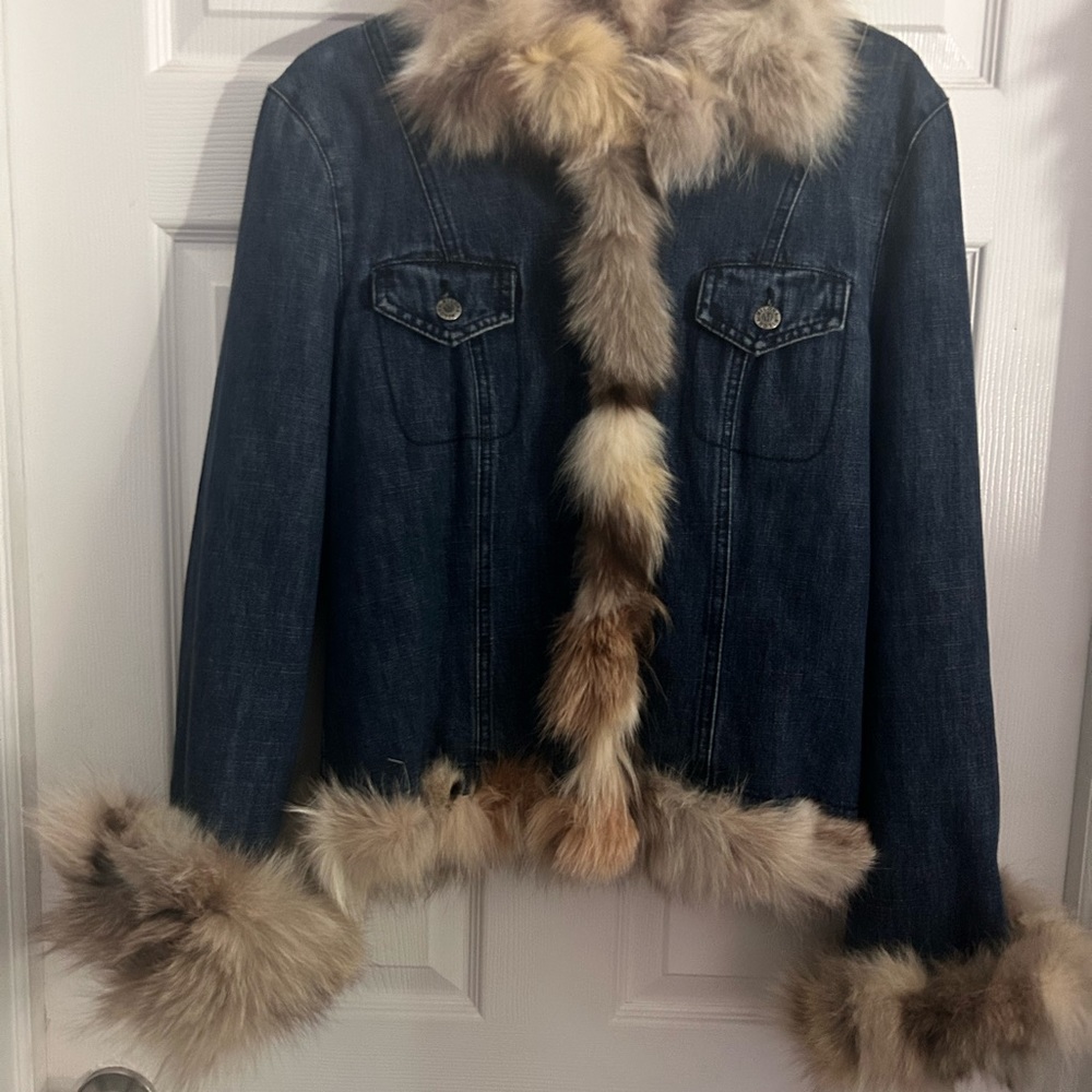 Real fox fur lined denim jacket. New without tags.  Never worn